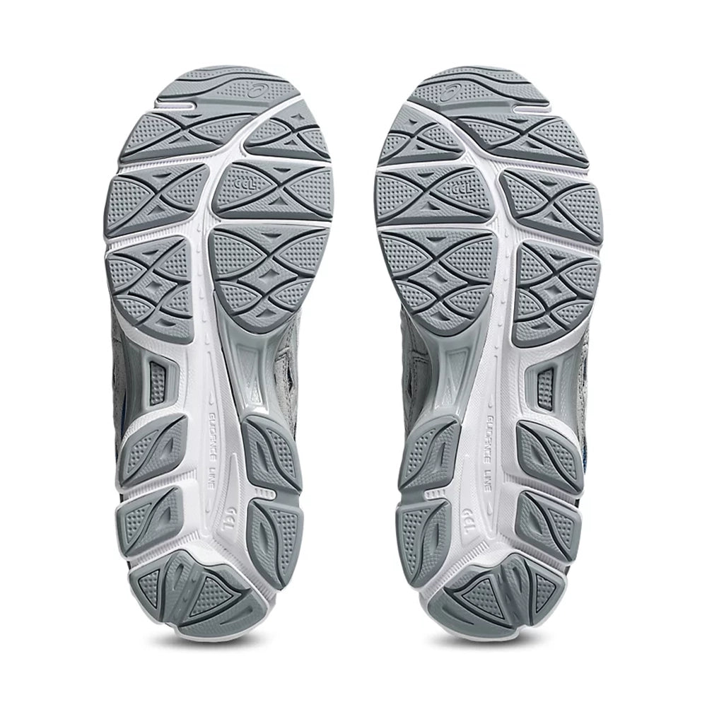 Bottom view of ASICS GEL-NYC Twilight Blue Gravel sneakers showing gray tread sections and white midfoot channels.