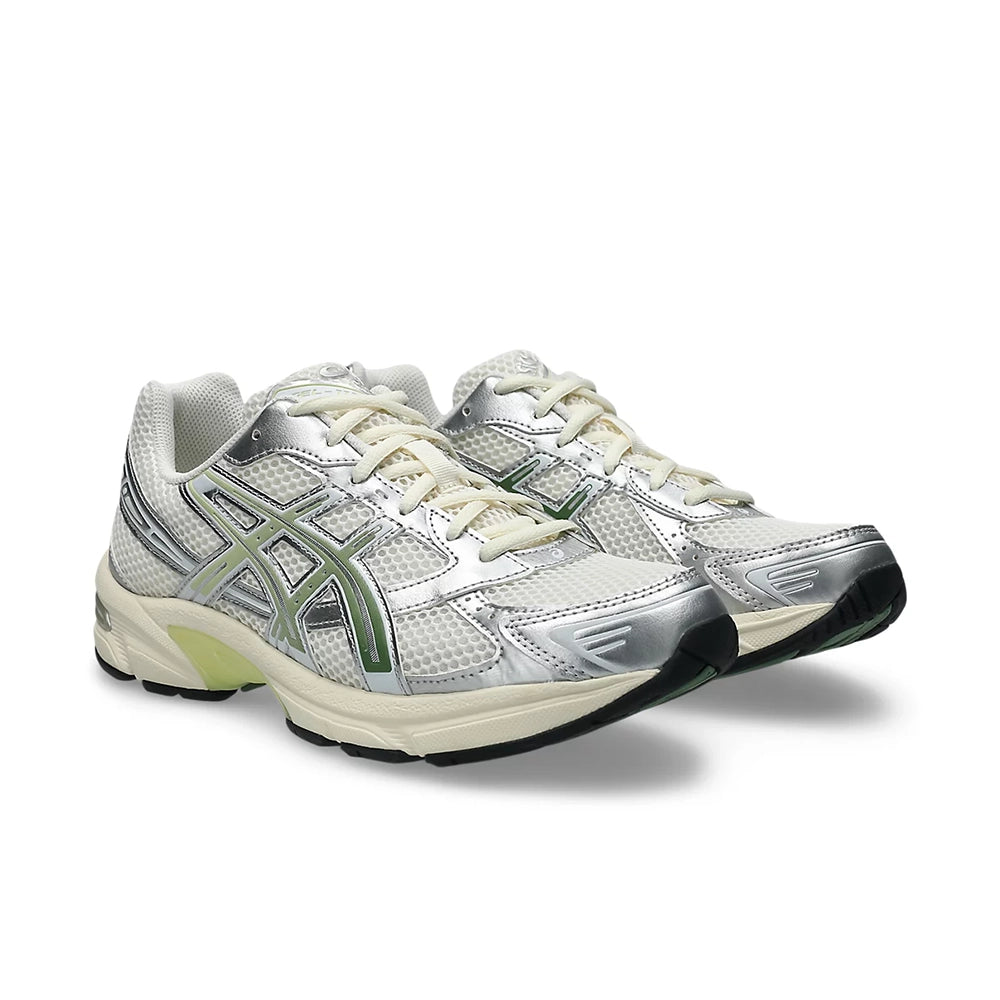 ASICS GEL-1130 Cream Cedar Green pair from a front three-quarter angle, showing silver overlays and cream laces.