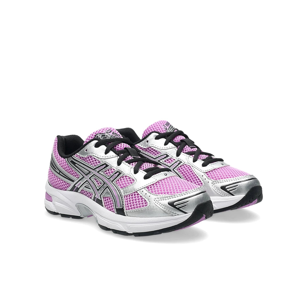 Pair of ASICS Gel-1130 GS kids sneakers in pink and silver, angled front view on a white background.