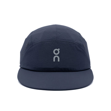 A dark navy blue On 5-panel running cap with a light gray logo on the front, shown against a plain white background.