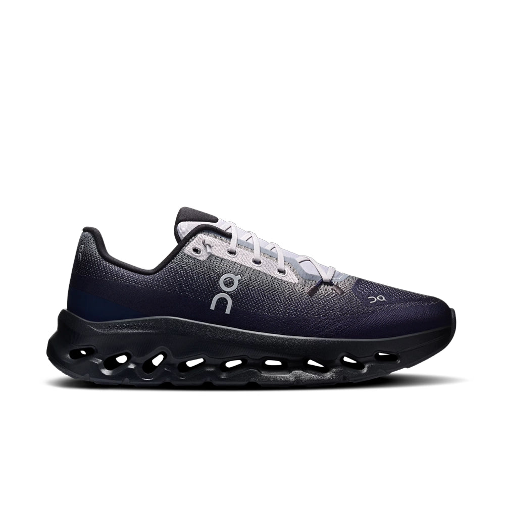 On Cloudtilt Platinum Midnight sneaker, side view with navy and gray mesh, light gray laces, and a black sculpted sole.