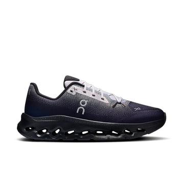 On Cloudtilt Platinum Midnight sneaker, side view with navy and gray mesh, light gray laces, and a black sculpted sole.