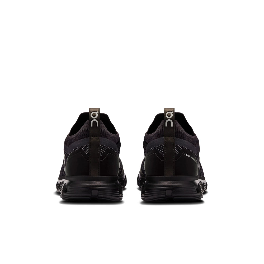 Rear view of On Cloud 6 Versa 'Black Eclipse' sneakers with branded heel pull tabs and black heel panels.