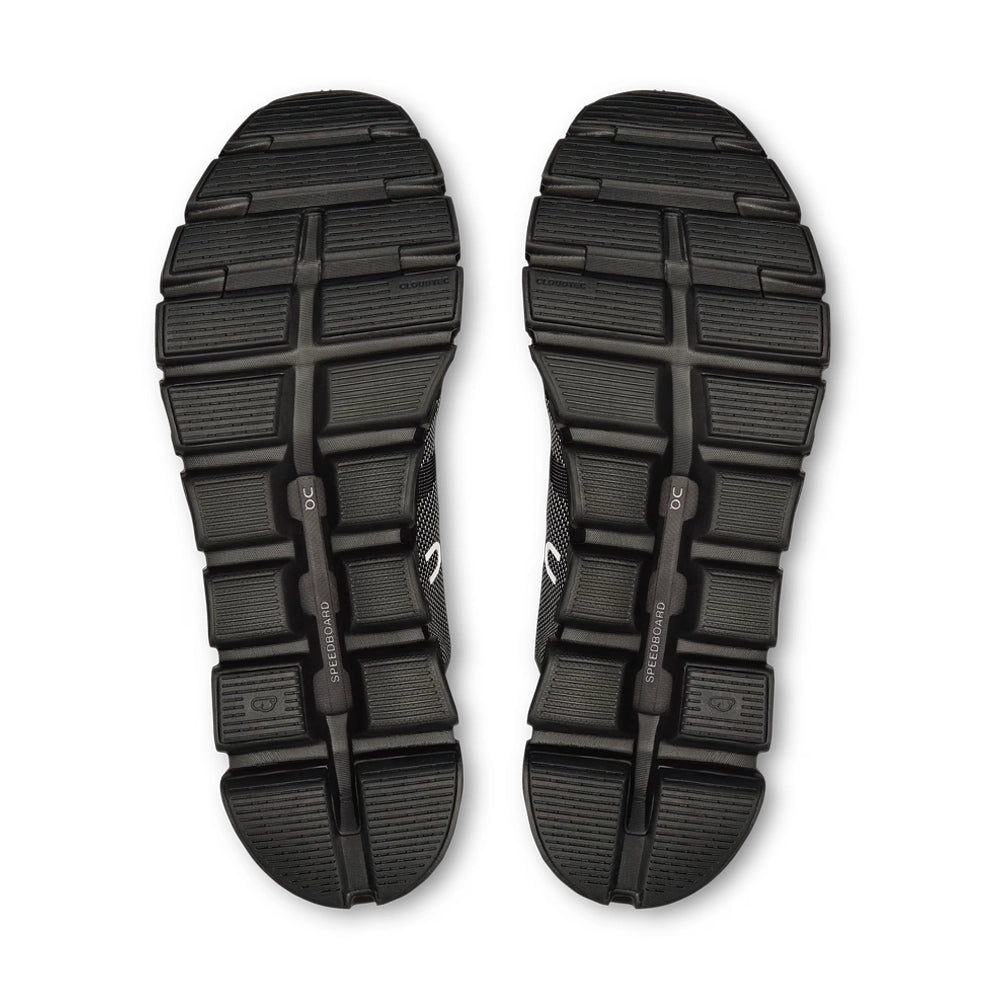Outsole view of On Cloud 6 Versa 'Black Eclipse' sneakers, showing segmented black tread and Speedboard branding.