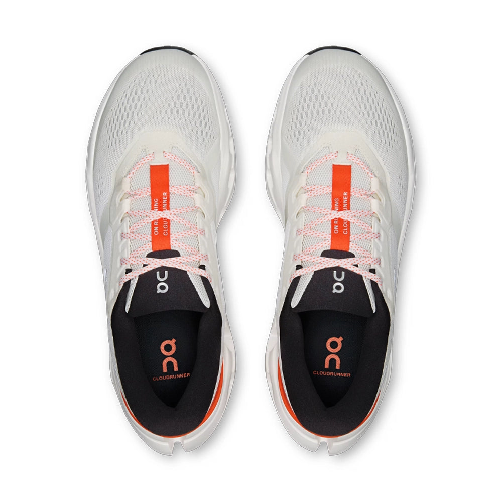 Top view of On Cloudrunner 3 Ivory Flame running shoes with light laces, orange tongue strips and black lining.