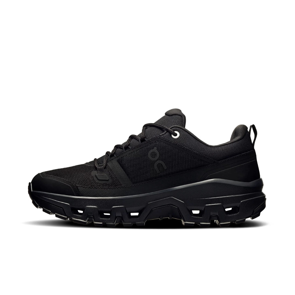 Opposite side view of the women's On Cloudrock Low Waterproof in black, showing the On logo and sculpted midsole.