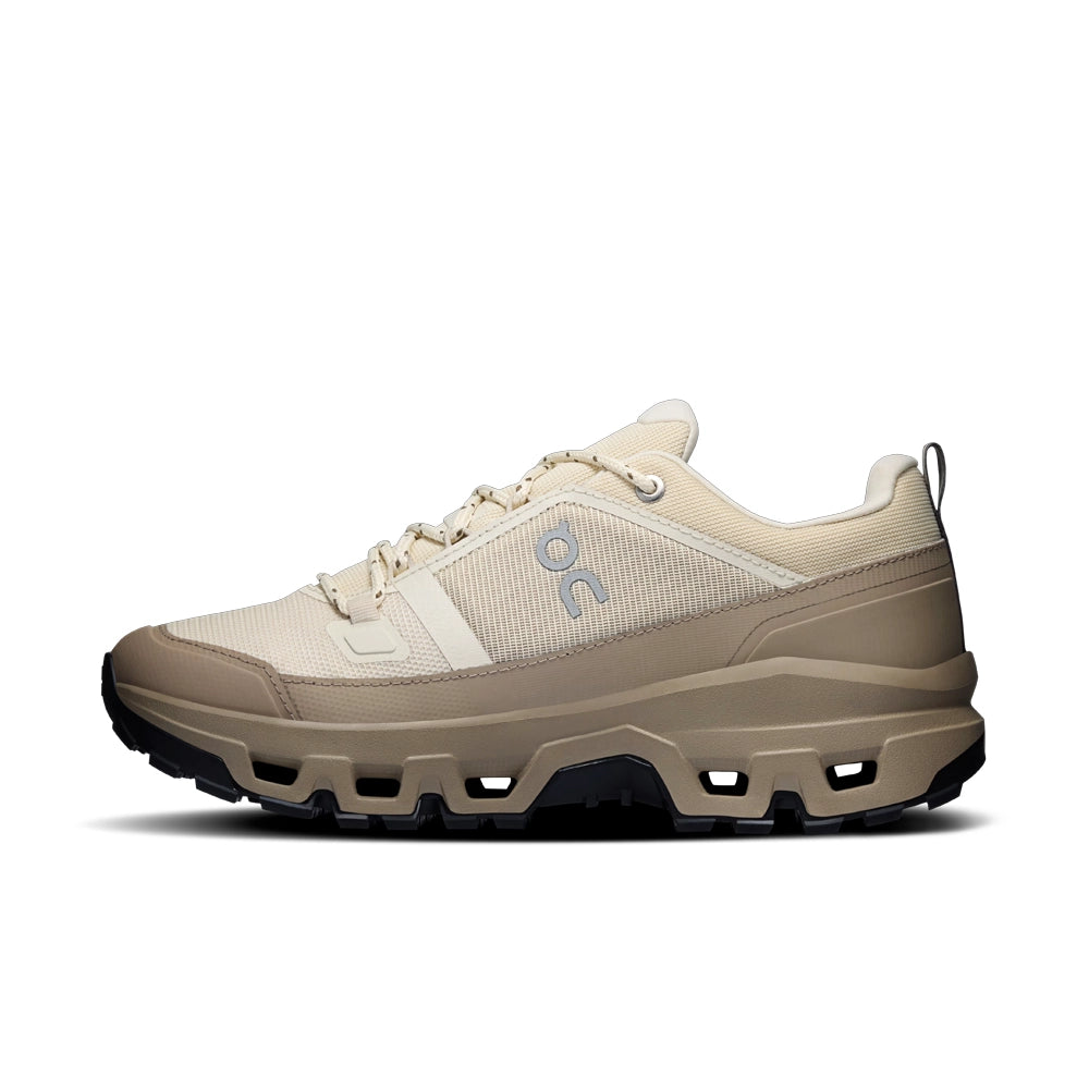 On women's Cloudrock Low Waterproof in Grain Soba, opposite side view showing the On logo and sculpted grayish-brown midsole.