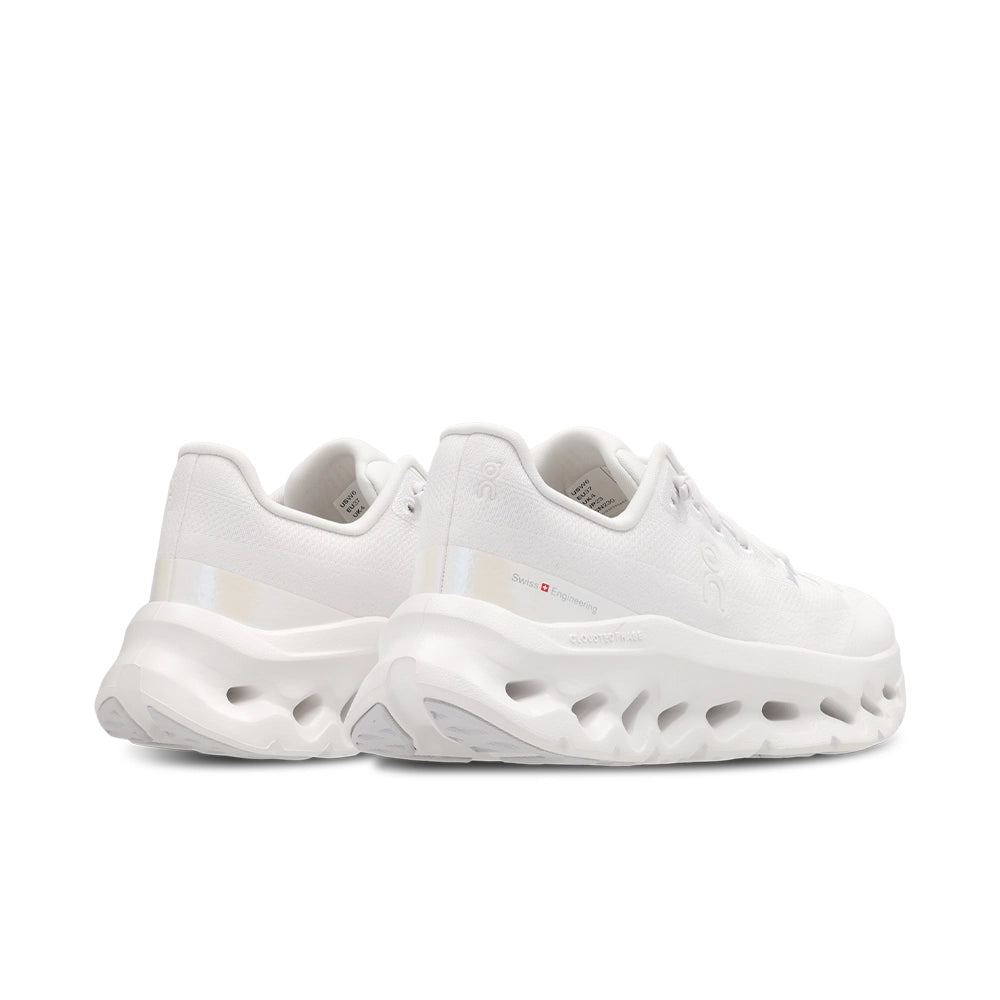 Pair of women's On Cloudtilt White Frost sneakers, rear three-quarter view showing heels and sculpted soles.