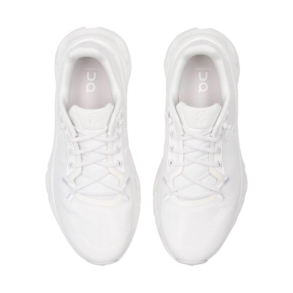 Top view of women's On Cloudtilt White Frost sneakers showing white laces, tongues, and On-branded insoles.