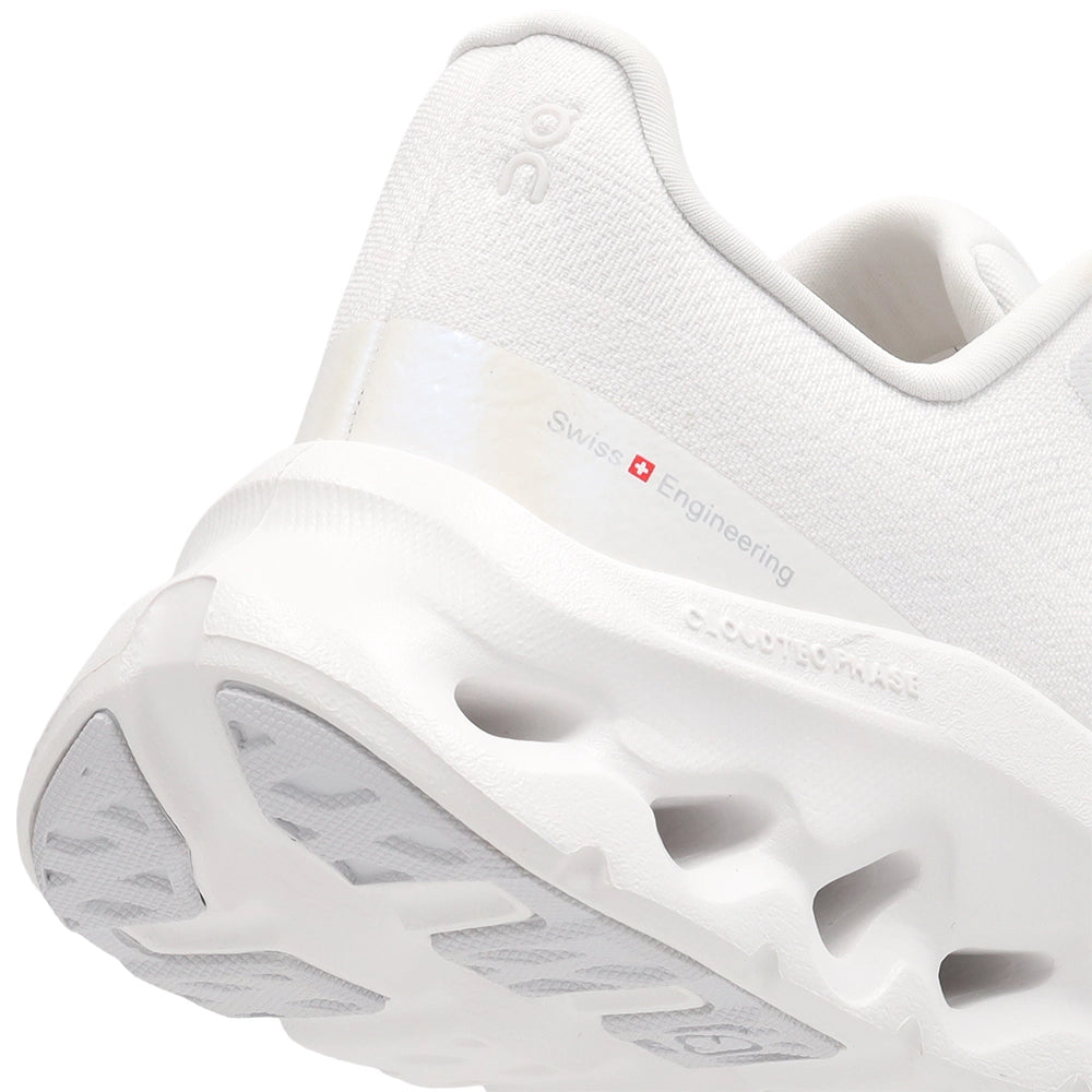 Close-up of the On Cloudtilt White Frost heel showing Swiss Engineering branding and sculpted midsole cutouts.