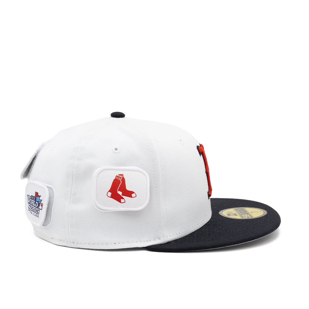 Side view of the white Boston Red Sox fitted cap featuring a red socks patch and a 2013 World Series patch.