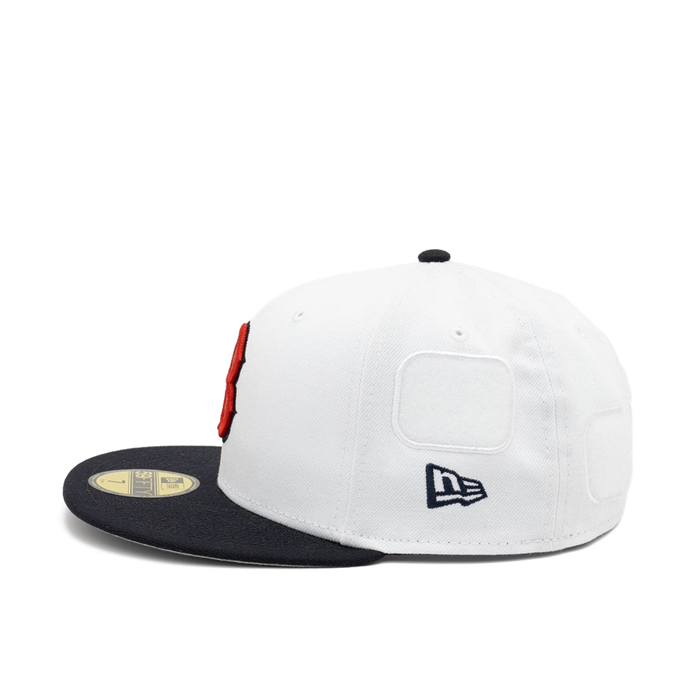Side view of the white Boston Red Sox fitted cap featuring a navy New Era flag and blank white patch panels.
