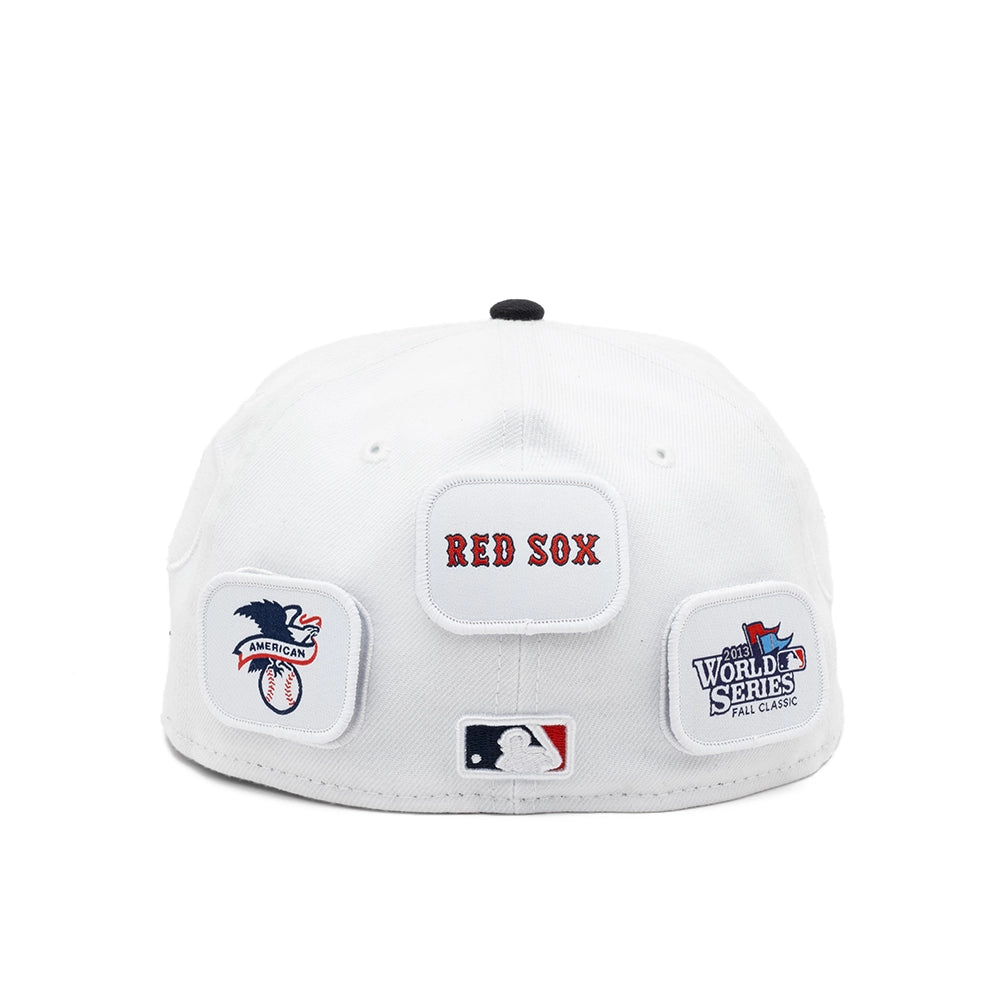 Rear view of the white Boston Red Sox fitted cap with Red Sox, American League and 2013 World Series patches.
