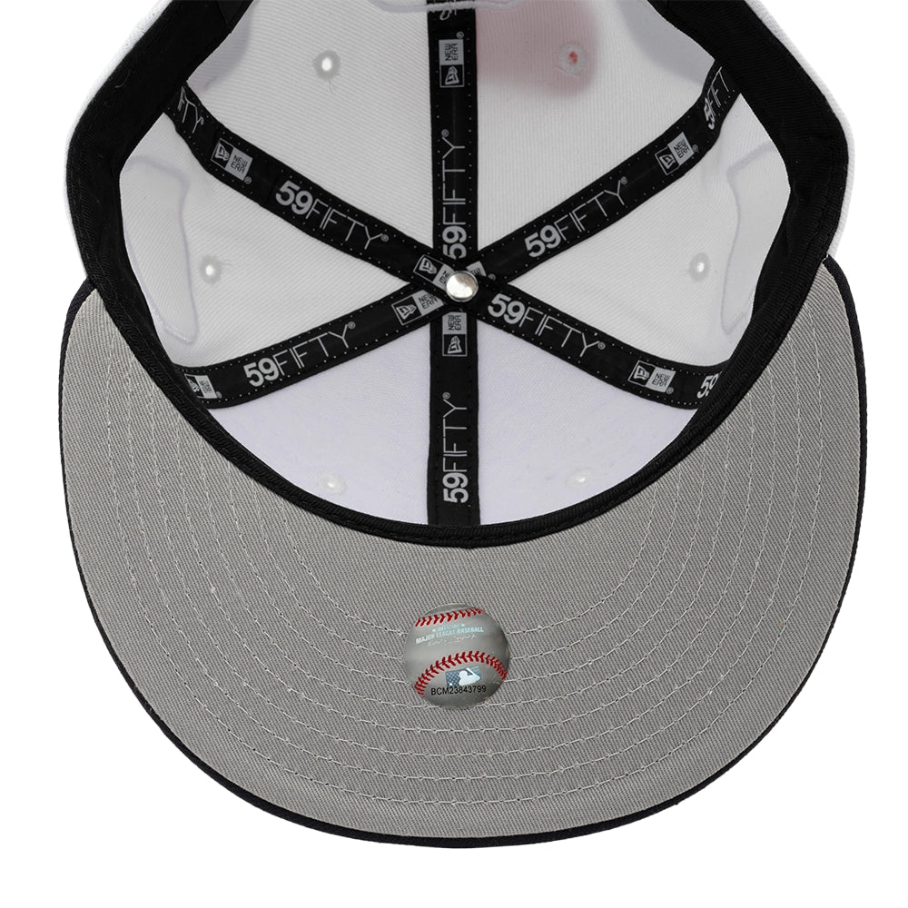 Interior view of the Boston Red Sox 59FIFTY fitted cap showing branded seam tape, a black sweatband and gray underbrim.