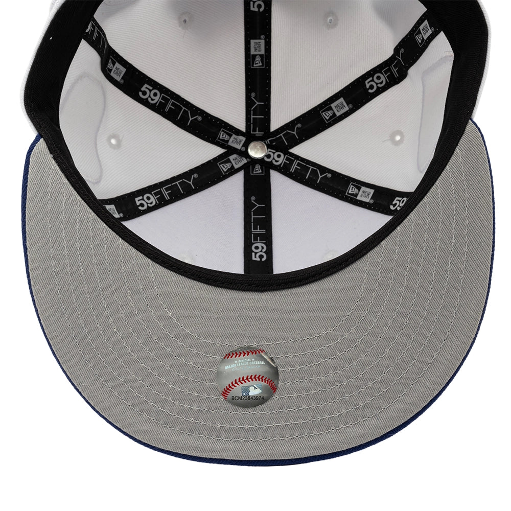 Interior view of the Dodgers 59FIFTY fitted cap with black branded seam tape, a black sweatband, and gray underbrim.