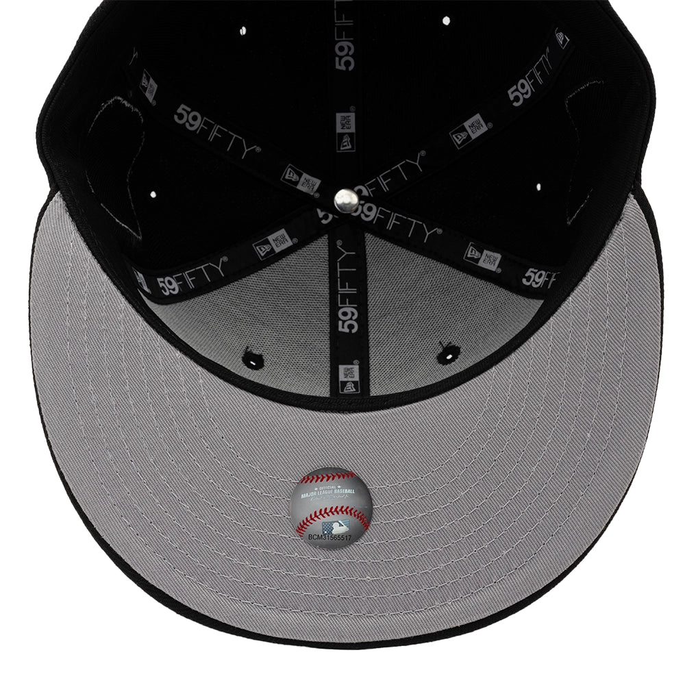 Interior of black Yankees 59FIFTY cap showing gray undervisor and 59FIFTY branded taping