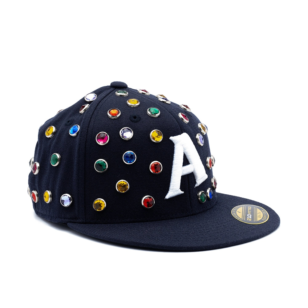 A black baseball cap embellished with colorful rhinestones and a white embroidered letter 'A' on the front, shown on a plain white background.