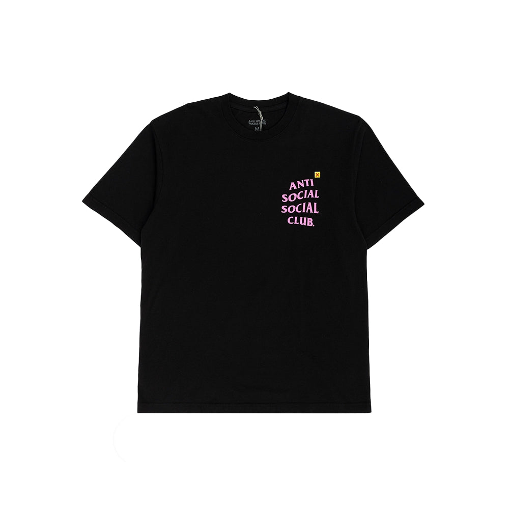 A black short-sleeve crewneck t-shirt with the text 'ANTI SOCIAL SOCIAL CLUB.' printed in pink on the left chest, accompanied by a small yellow square graphic, shown against a plain white background.