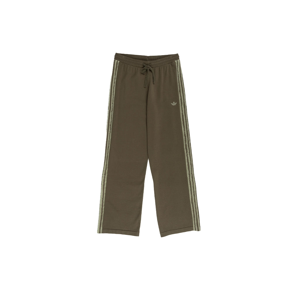 Front view of adidas women's Knit Firebird track pants in Branch Silver Pebble with drawstring waist and light side stripes.