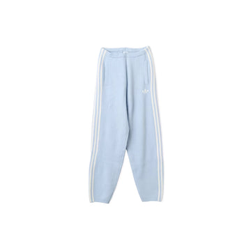 Front view of adidas x Jennie Wonder Blue knit pants with white 3-Stripes and a Trefoil logo.
