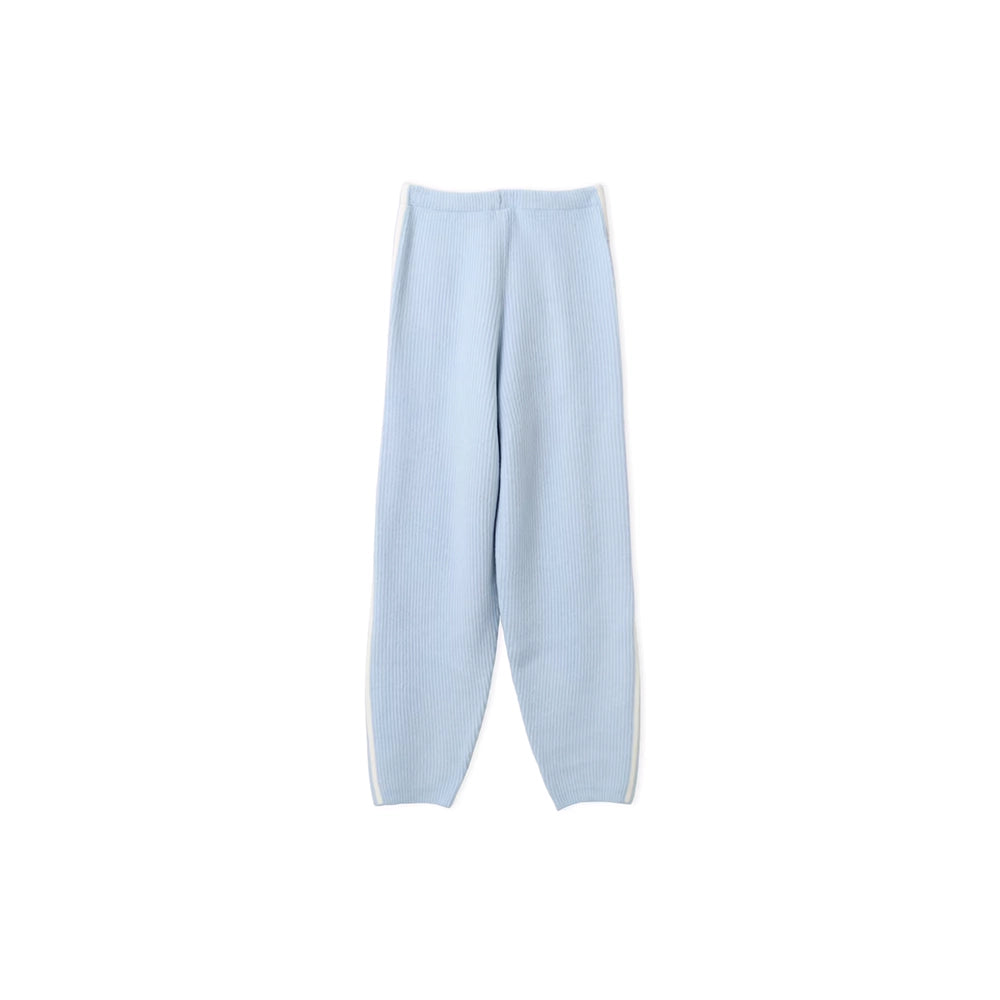 Rear view of adidas x Jennie Wonder Blue knit pants with a loose balloon-leg silhouette.