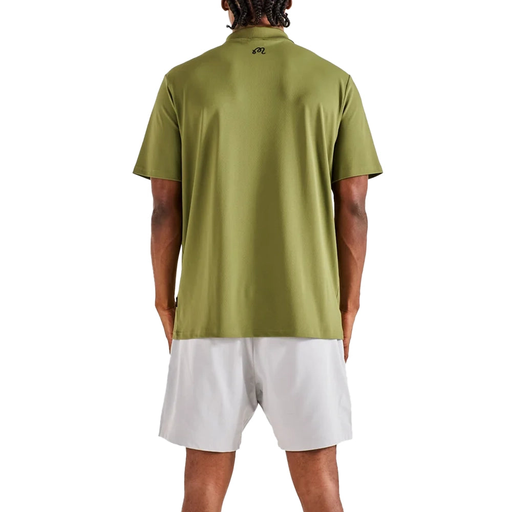 Back view of a model wearing the military green Malbon polo, showing its relaxed fit and small logo below the collar.