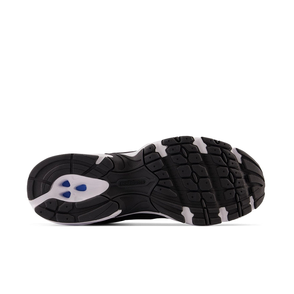 New Balance 530 Black Magnet Silver Metallic, outsole view showing black tread with white and blue heel details.