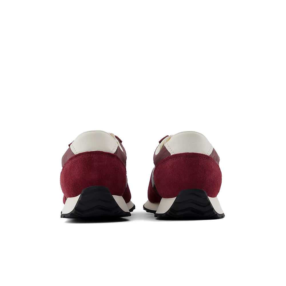 Rear view of New Balance 471 v1 Mulled Wine Fast Track sneakers with burgundy heels and cream heel tabs.