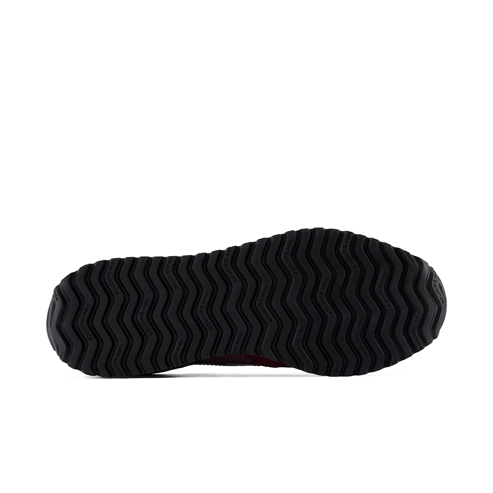 Black outsole of the New Balance 471 v1 Mulled Wine Fast Track sneaker with a wavy tread pattern.